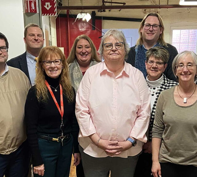 Photo of Riverside staff and DDS Commissioner Sarah Peterson