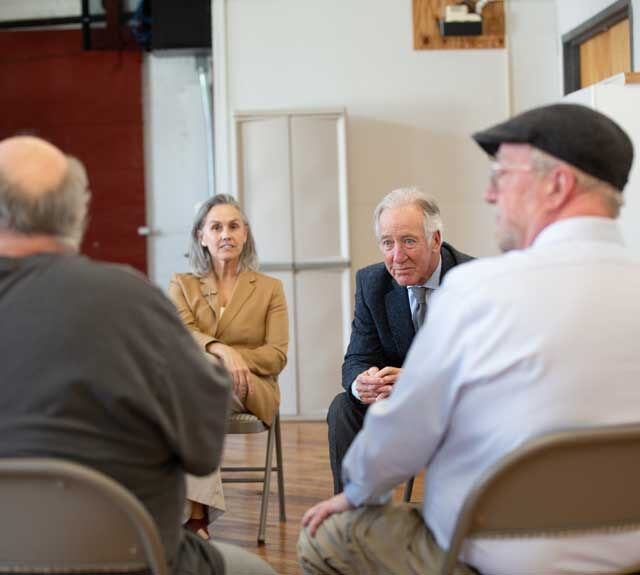 Photo of Congressman Richard Neal and Mayor LaChapelle meeting with RSI staff and clients.