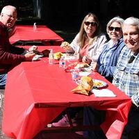 RSI Picnic 2022 together at a table